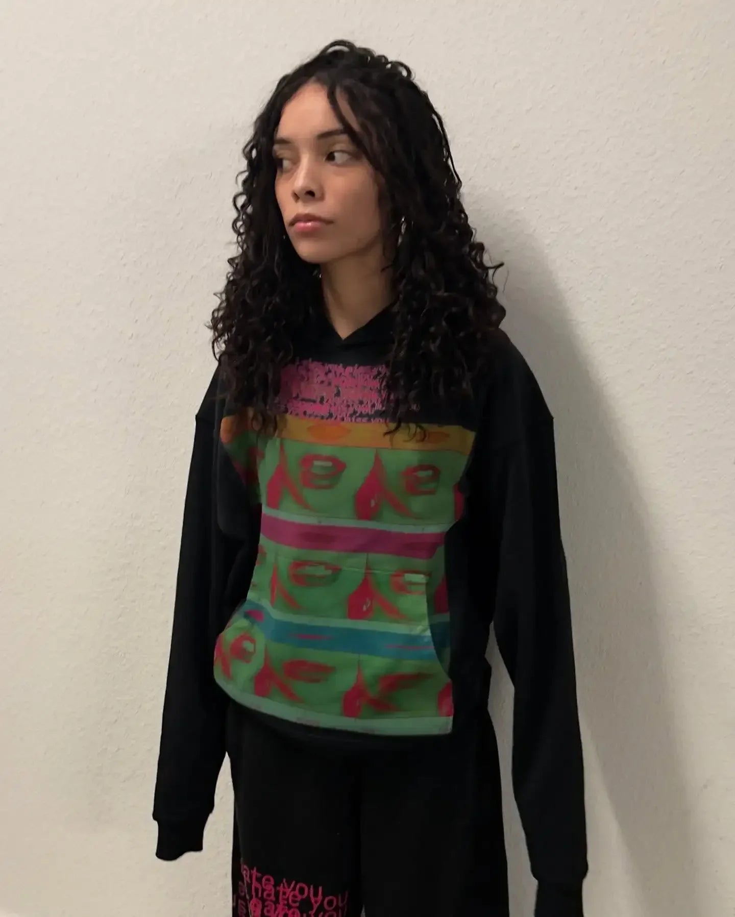 strange hoodie with green lips